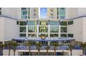 Beautiful entrance to Avista Resort, lined with palm trees and manicured landscaping at 300 N Ocean Blvd. # 324, North Myrtle Beach, SC 29582