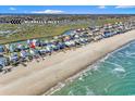 Beachfront homes near Murrells Inlet with ocean and marsh views at 885 S Waccamaw Dr., Garden City Beach, SC 29576