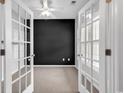 Bright office space with french doors, neutral carpet and ample natural light at 1018 Red Sky Ln. # 101, Murrells Inlet, SC 29576