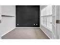 Cozy office featuring carpeted floors and a window with natural light at 1018 Red Sky Ln. # 101, Murrells Inlet, SC 29576