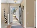 Inviting foyer featuring beautiful hardwood floors and views into the front yard at 2288 Beauclair Ct., Myrtle Beach, SC 29579