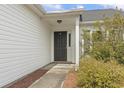 Close-up of front door with sidelight at 2288 Beauclair Ct., Myrtle Beach, SC 29579