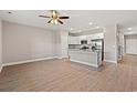 Bright, open kitchen with stainless steel appliances, granite countertops, and a spacious island at 344 Kiskadee Loop # D, Conway, SC 29526