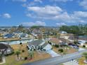 Residential area, with lush landscaping, a community lake, and manicured lawns at 3986 Lochview Dr., Myrtle Beach, SC 29588