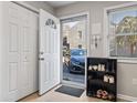 Welcoming entryway with coat closet and shoe rack for organization at 4606 Lomax Ct. # 4606, Murrells Inlet, SC 29576