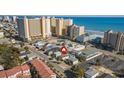 An aerial shot showing the home's proximity to the beach, and several high-rise resort hotels at 513 Hillside Dr. S, North Myrtle Beach, SC 29582