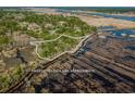 A beautiful aerial view shows the property lines of the land parcel that is for sale at 762 Wraggs Ferry Rd., Georgetown, SC 29440