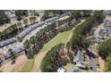 An aerial view of townhouses situated on a golf course at 850 Fairway Dr. # 1003Ee, Longs, SC 29568