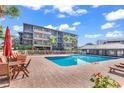 Exterior view of the outdoor swimming pool and lounge area at the condo building at 9501 Shore Dr. # D-132, Myrtle Beach, SC 29572