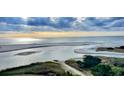 Expansive view of the shoreline, ocean, and blue sky at 101 Ocean Creek Dr. # Mm-5, Myrtle Beach, SC 29572