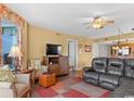 Comfortable living area featuring stylish decor and abundant natural light at 1706 S Ocean Blvd. # 1001, North Myrtle Beach, SC 29582