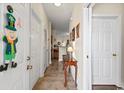 Charming hallway with neutral paint, leading to other rooms in the condo unit at 220 Portsmith Dr. # 2, Myrtle Beach, SC 29588