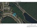 An aerial view shows the neighborhood's layout, highlighting proximity to natural areas and water features at 3120 Bayhaven Dr., Myrtle Beach, SC 29579