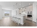 Stylish kitchen with modern stainless appliances, island with breakfast bar, and open layout at 3215 Preciado Dr., Myrtle Beach, SC 29579