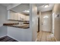 Cozy kitchen with white cabinets, countertops, tile floors, and modern appliances at 3555 Highway 544 # 4-C, Conway, SC 29526