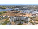 Wonderful aerial view of condo complex, Intracoastal Waterway, and marina at 4440 Nassau Ct. # D-507, Little River, SC 29566