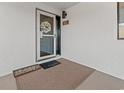 Inviting unit entrance featuring a welcome mat and charming decor at 4440 Nassau Ct. # D-507, Little River, SC 29566