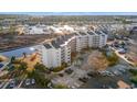 Beautiful view of waterfront condo complex and parking at 4440 Nassau Ct. # D-507, Little River, SC 29566