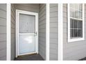 Exterior shot of the front door of the condo building at 4503 W Harbour Ct. # S-6, Little River, SC 29566