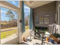 Relaxing patio space with outdoor seating and scenic views of the water at 4503 W Harbour Ct. # S-6, Little River, SC 29566