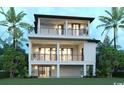 Elegant home featuring multiple covered balconies, seamlessly blending indoor and outdoor living spaces with stunning architecture at 4710 Surf St., North Myrtle Beach, SC 29582