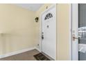Cozy entryway showcasing a charming white door with decorative hardware and a 'welcome' mat at 500 Willow Greens Dr. # 500-G, Conway, SC 29526
