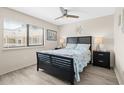 Comfortable bedroom with a nautical theme, a queen-sized bed, and ample natural light at 9661 Shore Dr. # B-22, Myrtle Beach, SC 29572