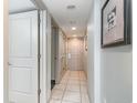 Hallway with tile floors, closet and doorways leading to rooms at 107 Ocean Blvd. S # 1707, Myrtle Beach, SC 29577