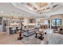 Spacious open-concept living area with adjoining kitchen, island, and dining area at 410 44Th Ave. N, Myrtle Beach, SC 29577