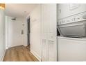 Condo hallway with wood floors, washer and dryer at 2701 S Ocean Blvd. # 1908, North Myrtle Beach, SC 29582
