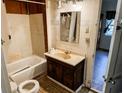 Bathroom featuring a toilet, vanity, and bath-tub/shower combination at 422 S Magnolia Ave., Andrews, SC 29510