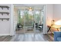 A screened-in porch featuring chairs and a table at 5801 Oyster Catcher Dr. # 724, North Myrtle Beach, SC 29582