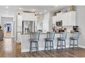Modern kitchen featuring stainless steel appliances, granite countertops, and stylish breakfast bar seating at 738 Harrison Mill St., Myrtle Beach, SC 29579