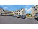 Desirable condo complex with private balconies, easy access parking, and peaceful atmosphere at 1100 Possum Trot Rd. # C202, North Myrtle Beach, SC 29582