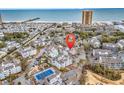 An aerial view shows the community near the beach with amenities like a pool and tennis courts at 351 Lake Arrowhead Rd. # 12-347, Myrtle Beach, SC 29572