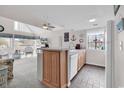 The kitchen opens to the living room and features an island with seating and casual dining space at 351 Lake Arrowhead Rd. # 12-347, Myrtle Beach, SC 29572