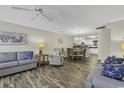 Inviting living room with stylish decor and an open floor plan that flows into the dining area and kitchen at 4291 Parkway Ln. # 4291, Little River, SC 29566