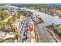 Scenic aerial view showcases this condo's proximity to waterfront and adjacent marina at 4413 Eastport Blvd. # F-1, Little River, SC 29566