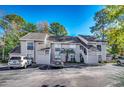 Well-maintained condo building featuring ample parking at 4466 Little River Inn Ln. # 906, Little River, SC 29566