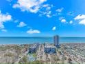 Expansive aerial view showcasing the beachfront condos, pools, and ocean views at 5905 S Kings Hwy. # 216B, Myrtle Beach, SC 29577