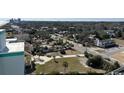 Elevated view of neighborhood showing houses and trees as seen from the Monterey Bay Suites in Myrtle Beach at 6804 N Ocean Blvd. # 1237, Myrtle Beach, SC 29572