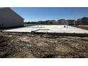 New home foundation featuring concrete slab with pipes and a view of the surrounding community at 899 Agostino Dr., Myrtle Beach, SC 29579