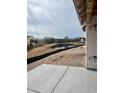 A picturesque pond view with surrounding landscapes and clear skies at 1241 Lady Bird Way, North Myrtle Beach, SC 29582