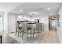 This modern eat-in kitchen has stainless appliances, granite countertops, and sleek cabinets at 2151 Bridge View Ct. # 2705, North Myrtle Beach, SC 29582