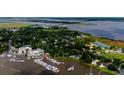 Breathtaking aerial view of the waterfront community with marina and boat docks at 201 River Rd., Georgetown, SC 29440