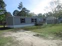 This single-story home has a well-maintained yard with plenty of space at 2016 Misty Morning Dr., Conway, SC 29527
