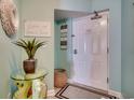Charming entryway with beach-themed decor, including a decorative seahorse table, perfect for a coastal home at 4103 N Ocean Blvd. # 304, North Myrtle Beach, SC 29582