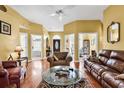 Spacious living room showcasing hardwood floors and open access to other rooms at 540 Alderly Ct., Little River, SC 29566
