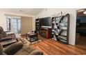 Inviting living room boasts hardwood floors, a fireplace, and plenty of room for entertaining at 793 Drawbridge Dr., Conway, SC 29526