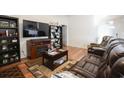 Inviting living room boasts hardwood floors, a fireplace, and plenty of room for entertaining at 793 Drawbridge Dr., Conway, SC 29526